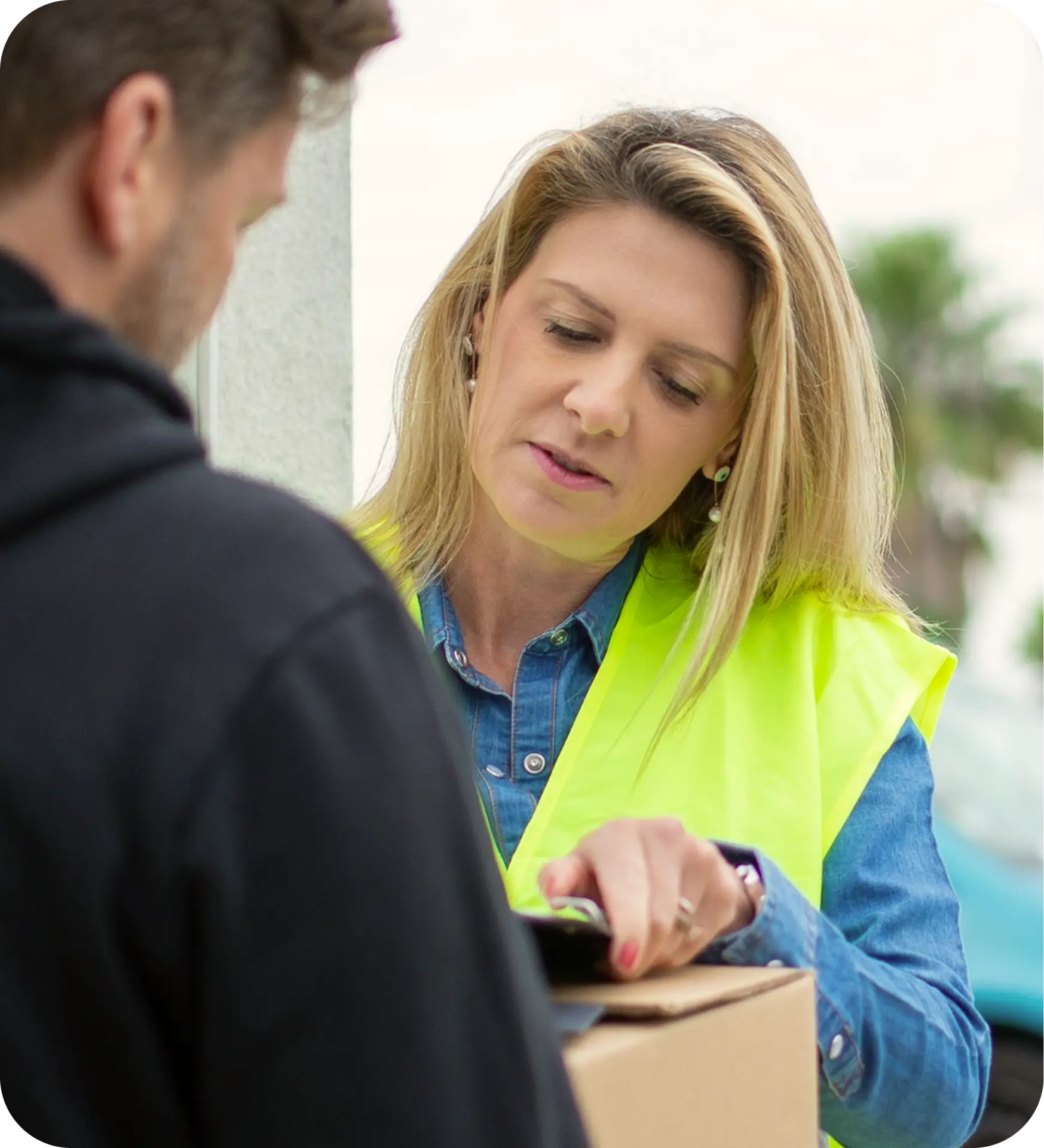 Logistics professional inspecting a shipment